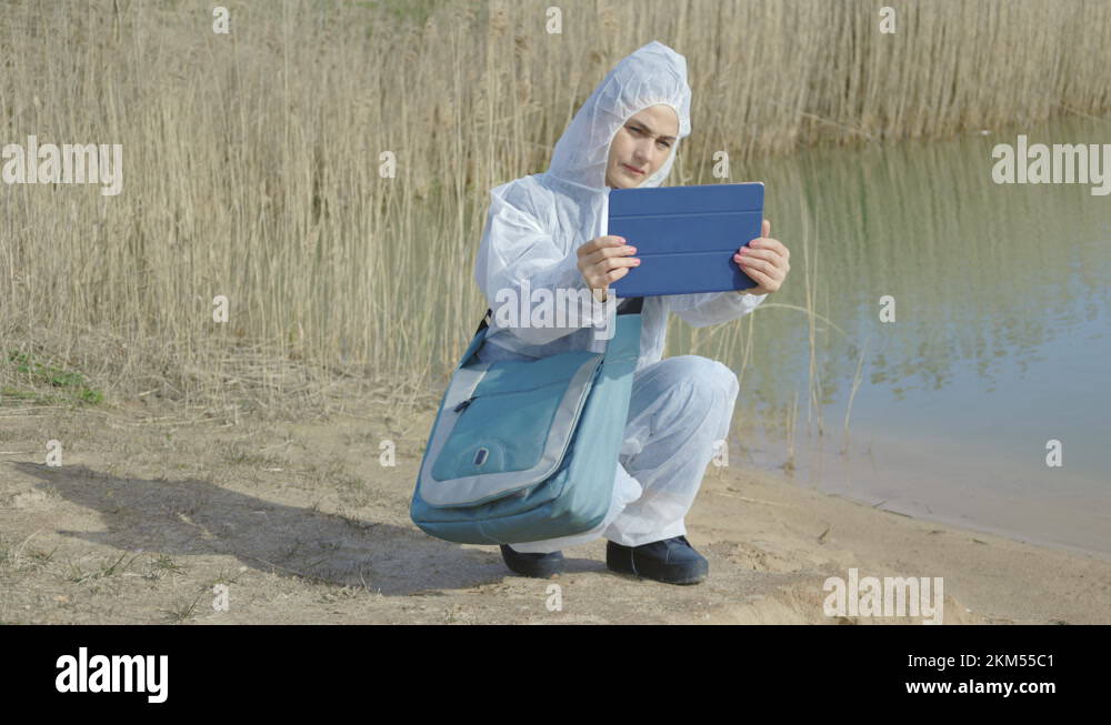 Water quality inspector taking sample pictures.Water pollution concept