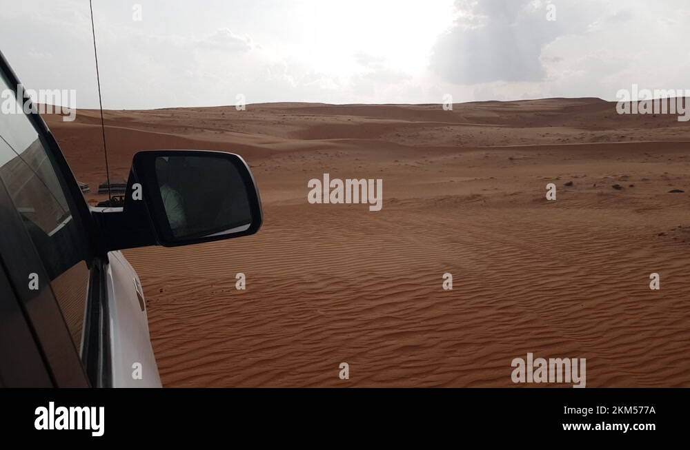 Passenger Window POV of Car Driving in Desert to Camp Stock Video