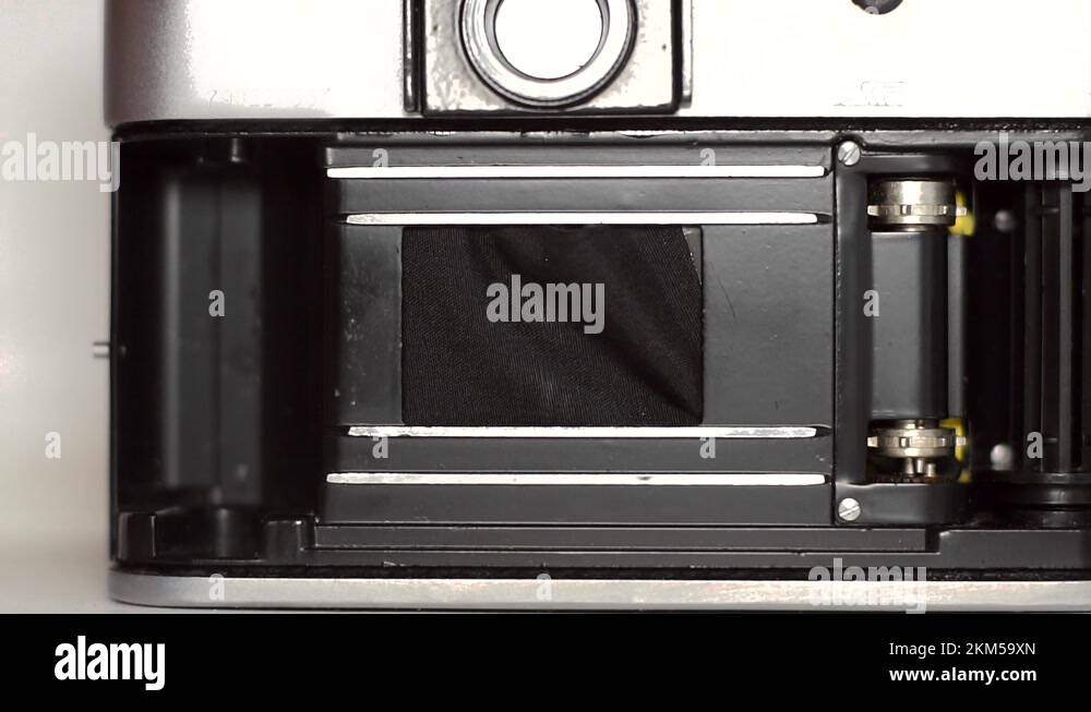 Working of a broken shutter of an old film camera, slow motion Stock