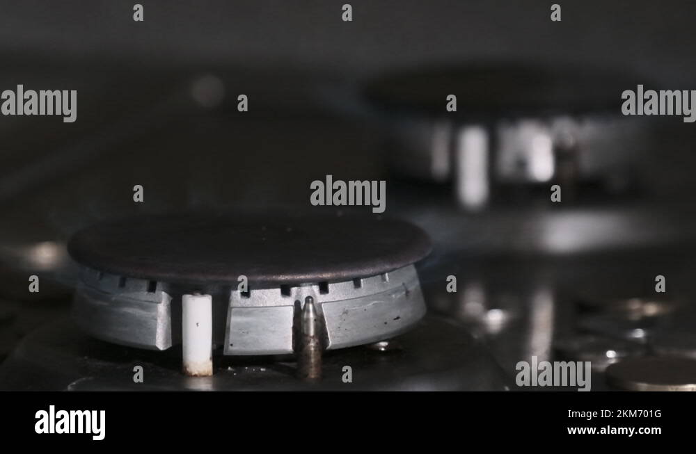 Two Gas Burner on, Glowing with a Blue Flame in Kitchen. Slow Motion