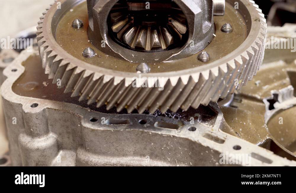 Large Helical Gear Wheel Disassembled From A Broken Gearbox Housing Of
