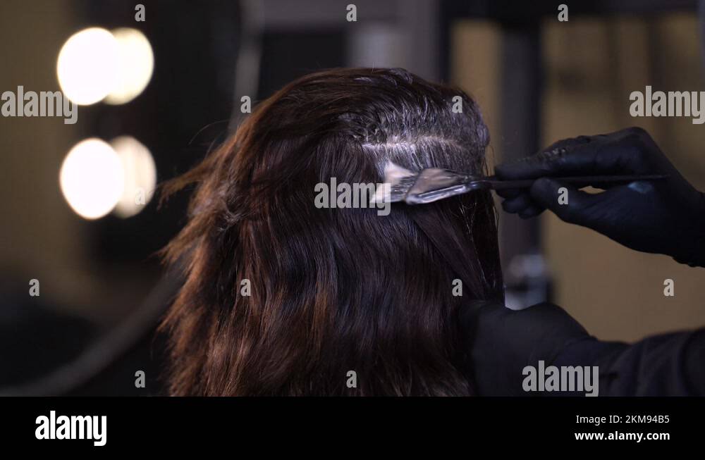 man In Gloves Is Dying Hair. Hair Dyeing. Beauty Making, People In