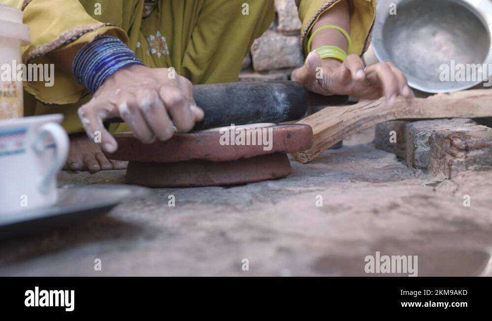 Village Roti Shop Village cooking roti Stock Videos & Footage - HD and 4K Video Clips - Alamy