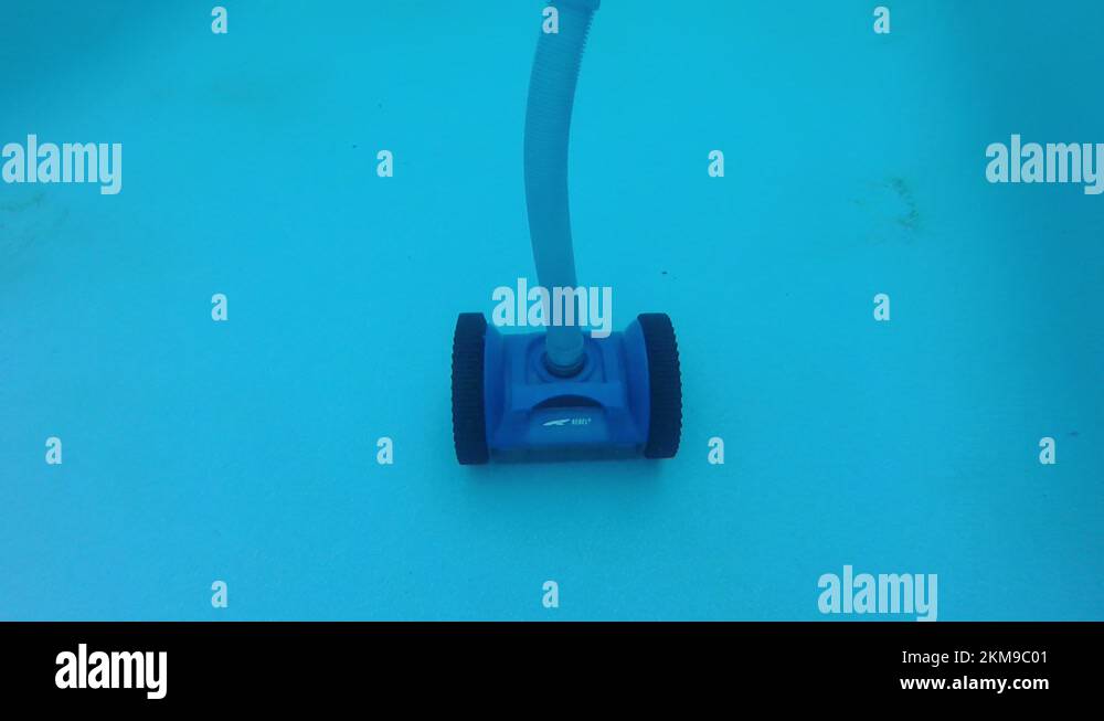 Underwater View Of Robotic Swimming Pool Cleaner Turning On Pool Floor