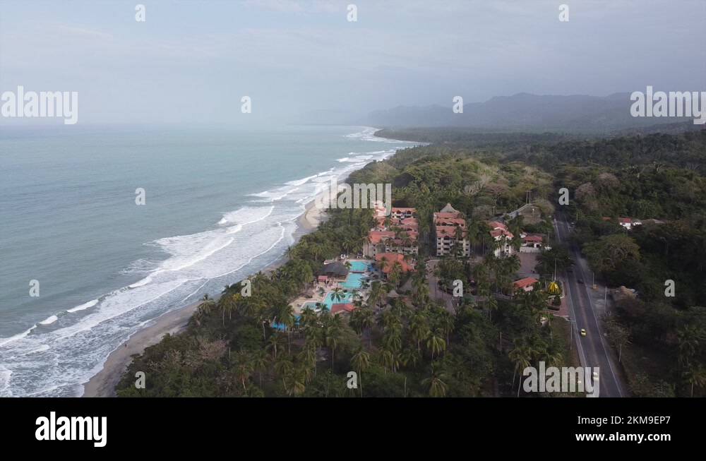 Resort hotel aerial on long stretch of Playa de Mendihuaca in Colombia