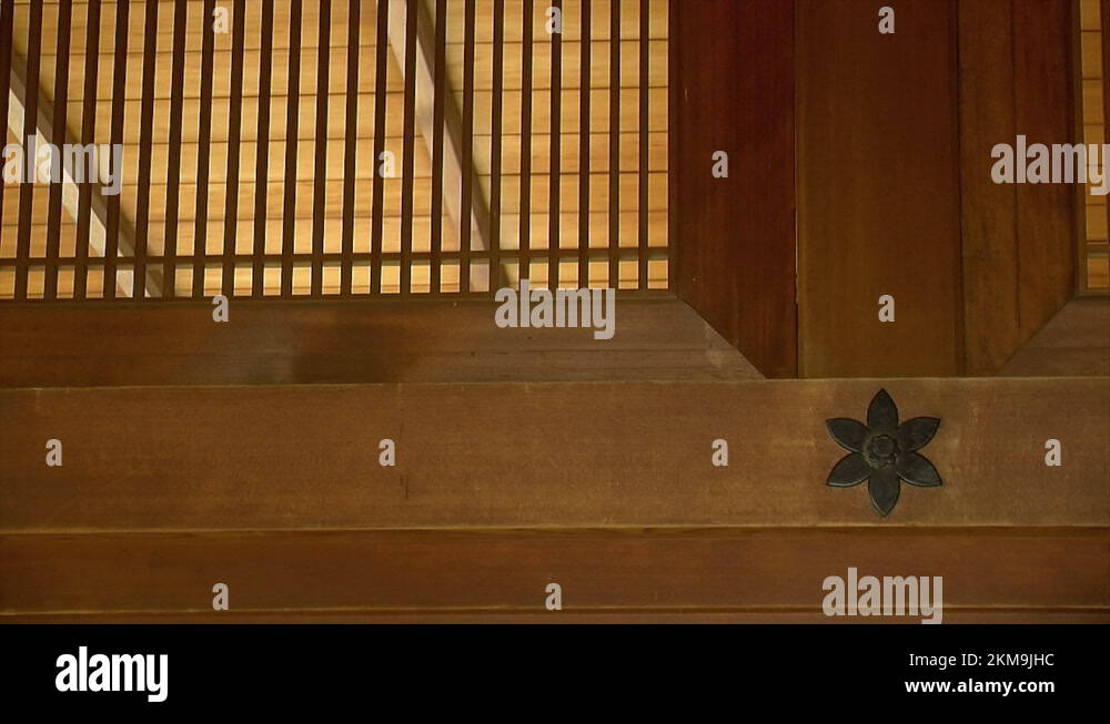 Hinoki wood beams and latticework with star-shaped kugi kakushi ...