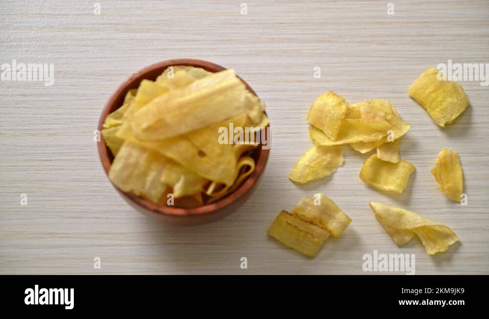 Crispy Banana Chips - fried or baked sliced banana Stock Video Footage