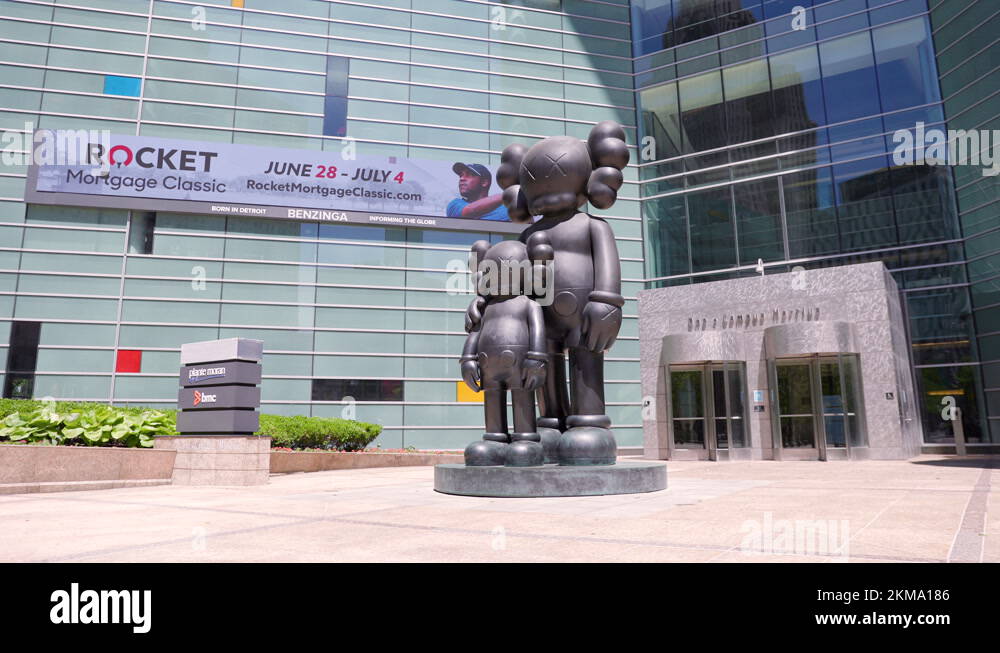 KAWS Waiting sculpture outside of One Campus Martius Detroit 4k Stock