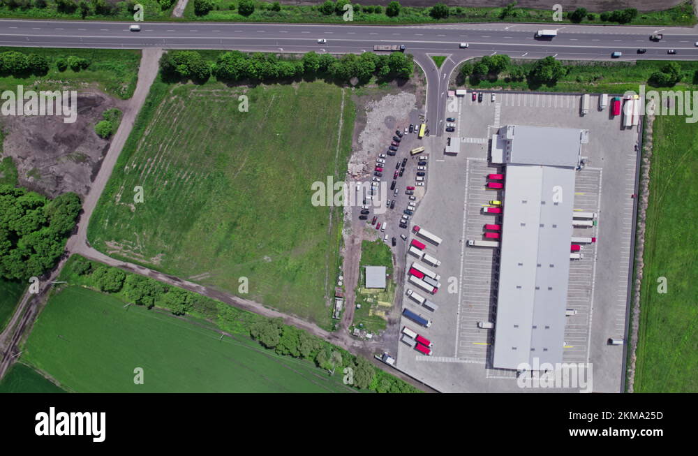 Logistics center in industrial city zone from above Stock Video Footage