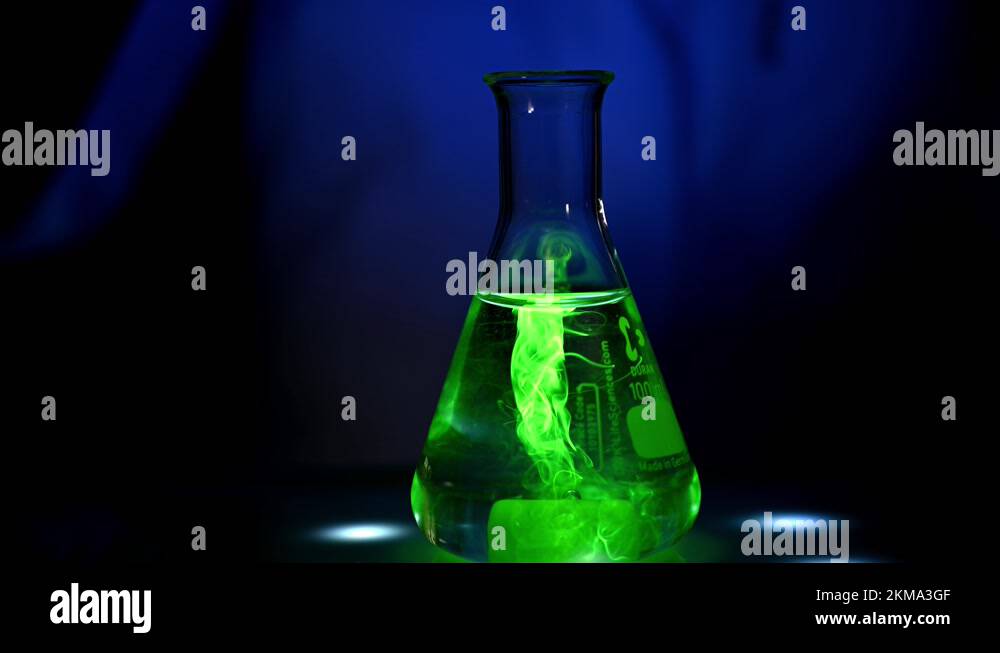 A glowing Science lab for kids with fluorescent green liquid inside of