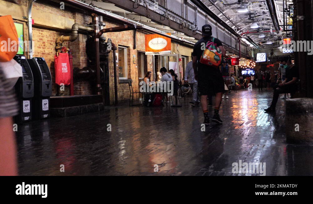 people shopping at Chelsea Market , food court New York NY USA Stock