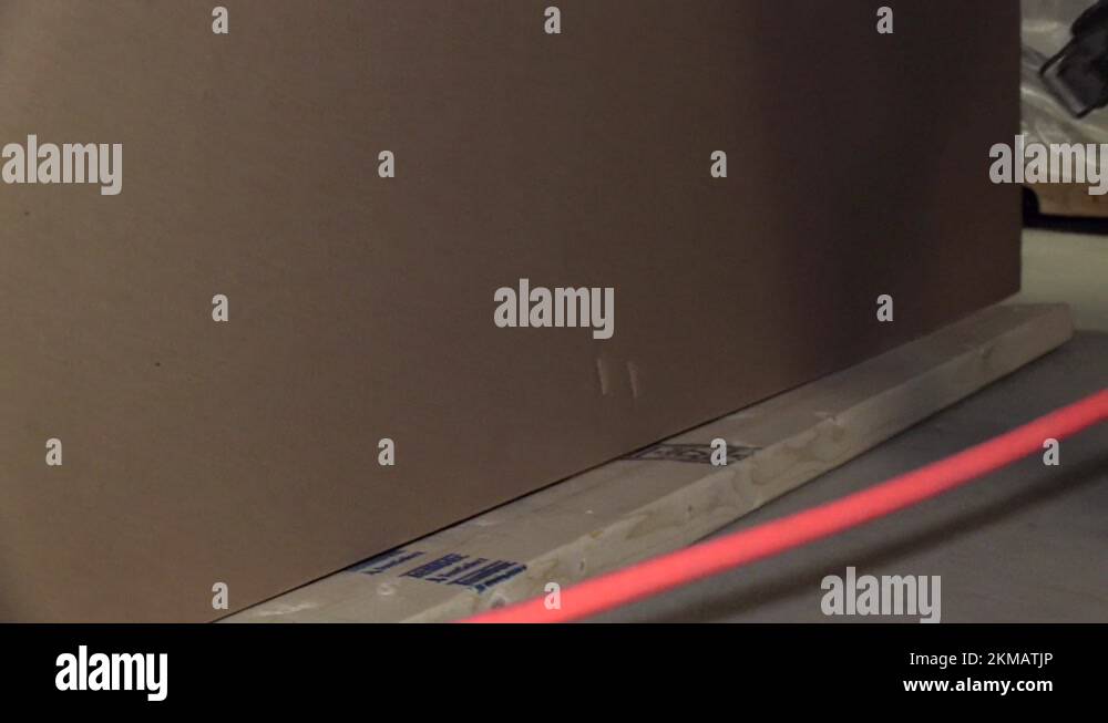 Staple gun stapling cardboard on pallet for large shipment Stock Video