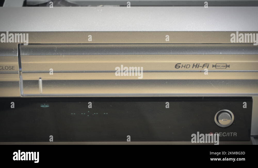 Closeup shot of a confidential evidence vhs cassette coming out of a