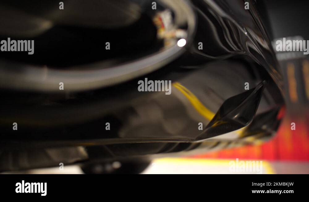 Rear bumper and exhaust system of a clean clean new modern car Stock