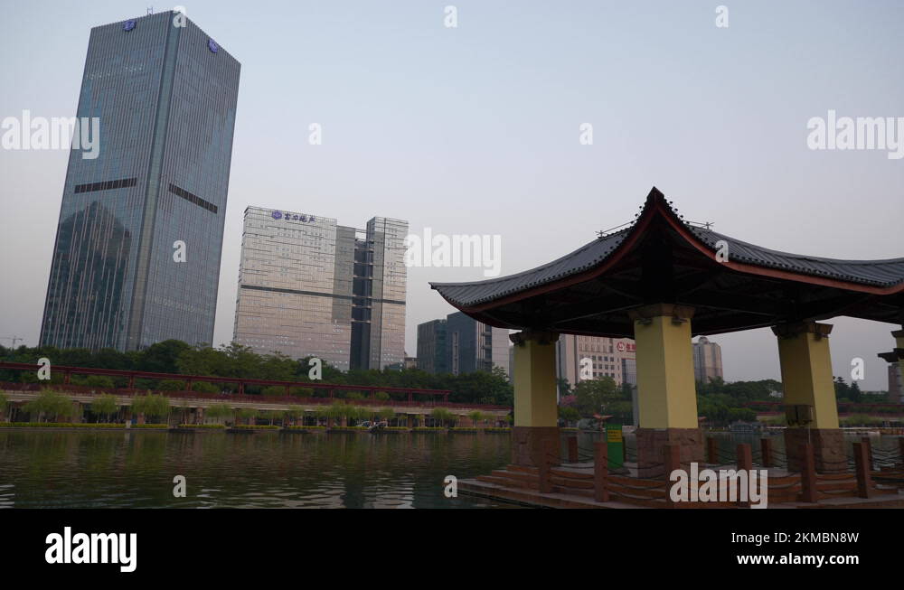 sunset foshan city famous riverside bay park slow motion downtown 4k