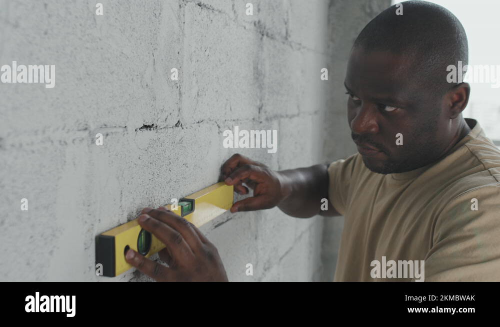 Man using level tool Stock Videos & Footage - HD and 4K Video Clips - Alamy