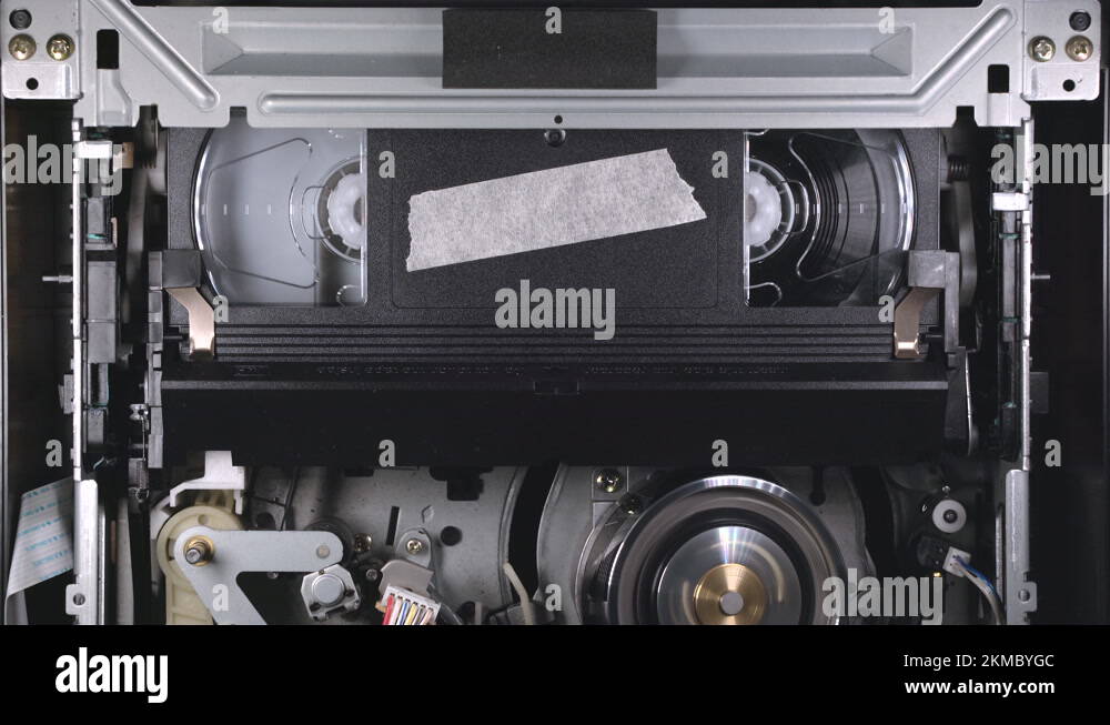 VHS cassette insert in VCR, play from beginning, then eject at the end