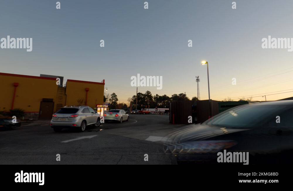 Timelapse Popeyes fried chicken restaurant building and drive thru