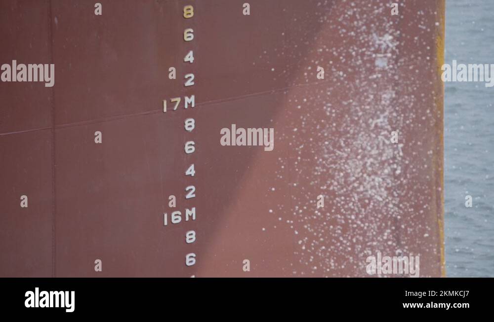 Ballast Water Discharge From A Cargo Vessel At Daytime. close up Stock ...