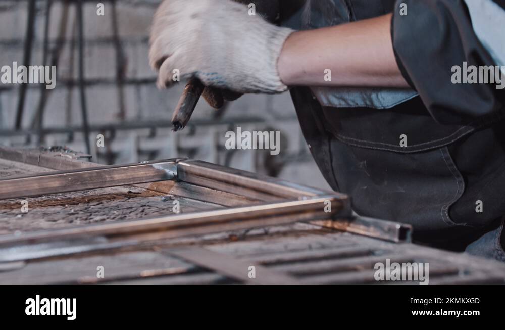 Process of welding two parts of the metal detail together Stock Video