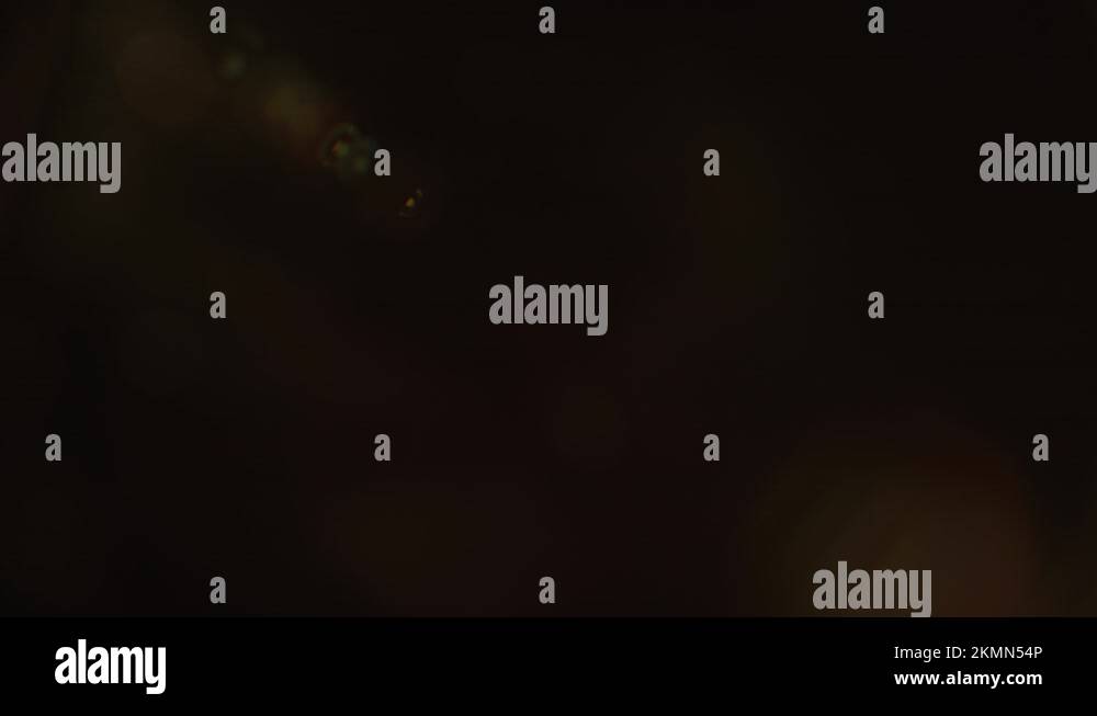 Lens Flare 21 Subtle Oragne with Orbs v2 Stock Video Footage Alamy