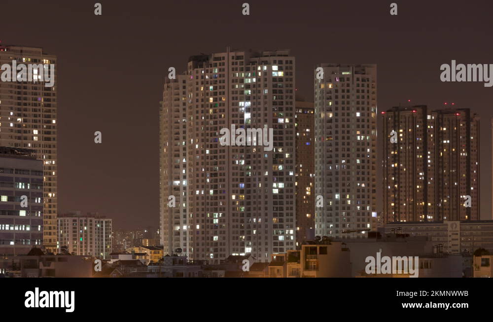 Night Sky City Lights Time Lapse With High rise Apartment Buildings night-sky-city-lights-time-lapse-with-high-rise-apartment-buildings