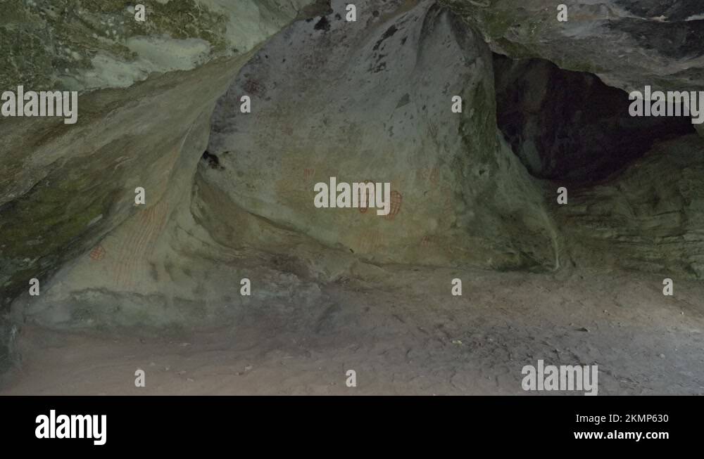 Ancient Rock Wall Paintings Inside The Cave Of Nara Inlet In Queensland