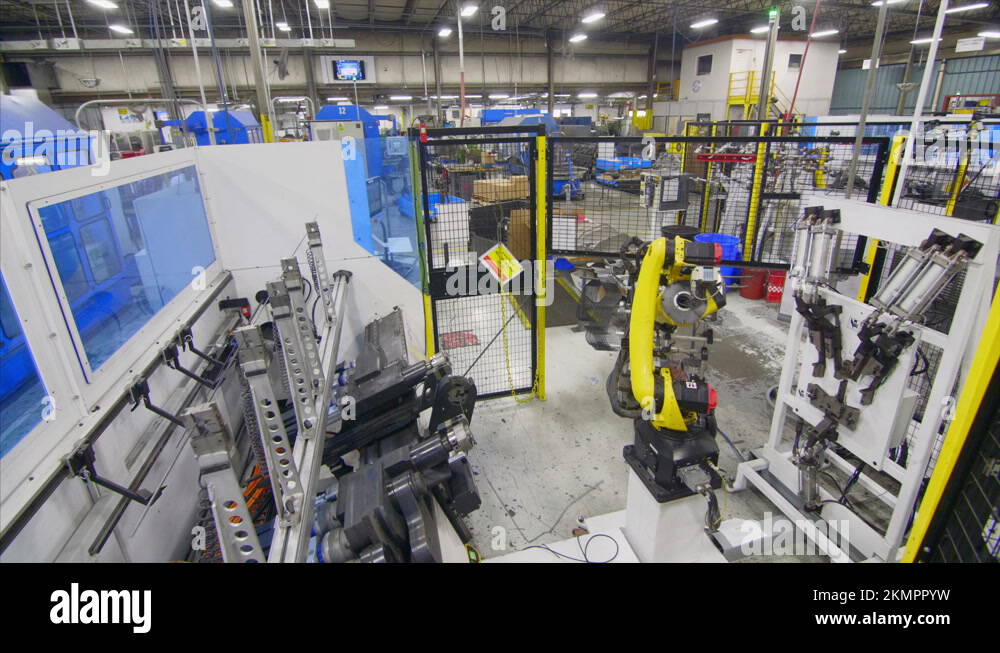 Industrial robot arm preforming operations to create wire frames Stock