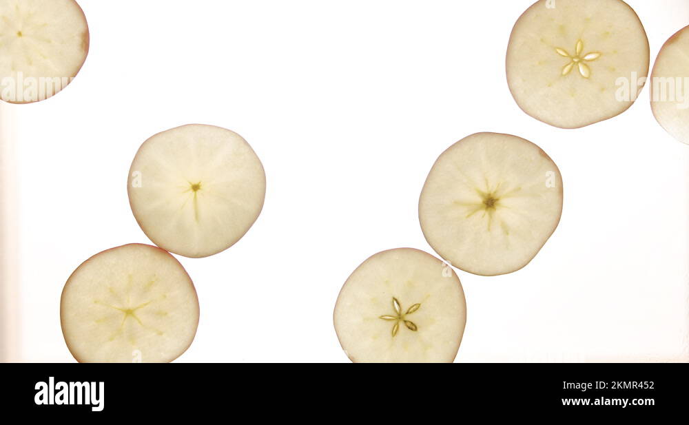 fruit fresh apples slice in top view they appear one by one for commercial juice Stock Video