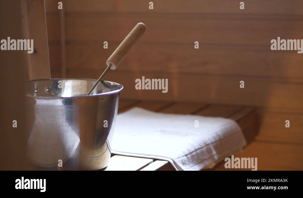 Traditional Sauna Finland, Water Bucket And Towels, Tilt Up Close Up