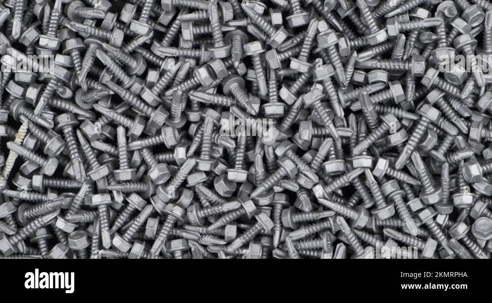 Screw Rotation Jpg Rotation of a heap, screws with drills. Background and texture of ...