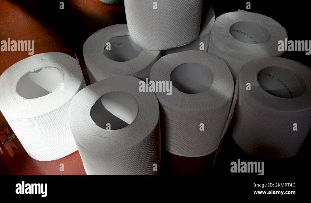 A stack of white toilet paper rolls in an outhouse toilet with beautiful Stock Video Footage Alamy