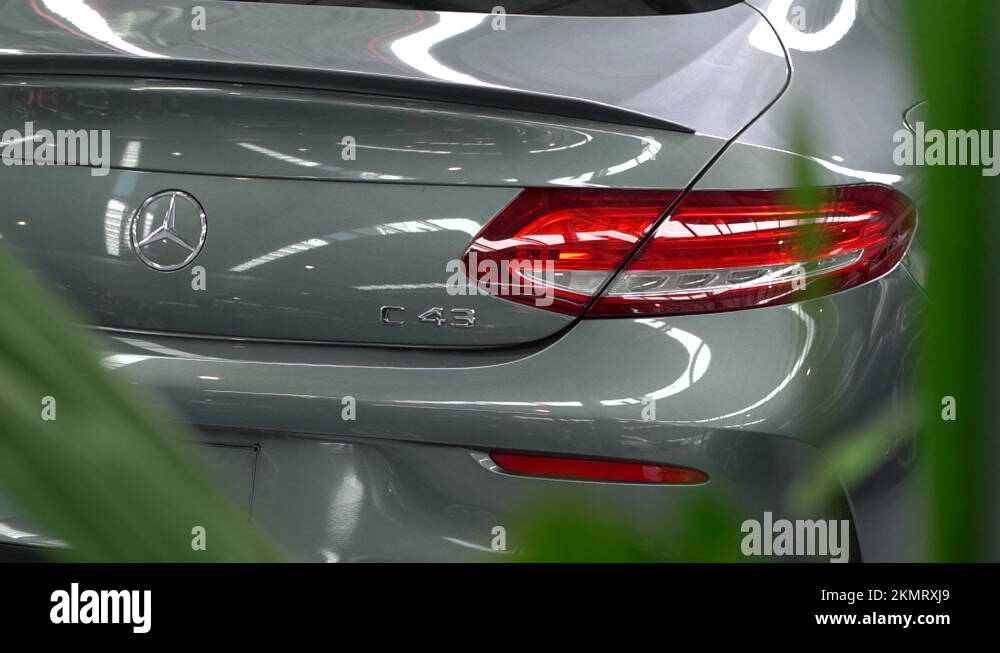 Polished back of Mercedes Benz C43 AMG in modern luxury garage, truck