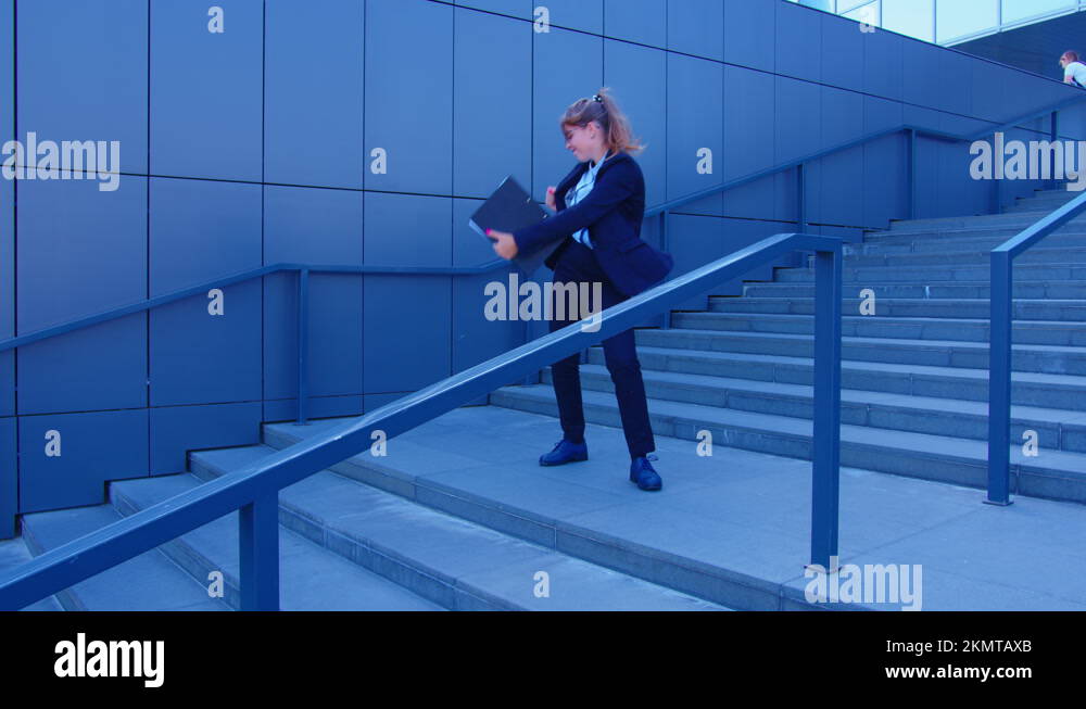 a-woman-is-going-down-the-stairs-and-starting-a-crazy-dance-stock-video