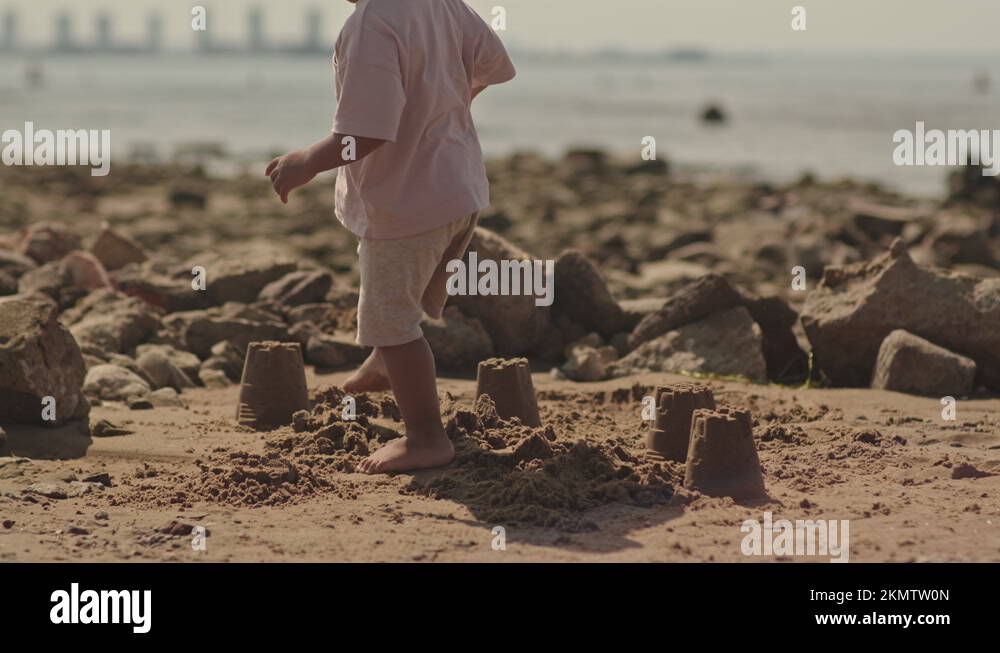 Stomping sandcastle Stock Videos & Footage - HD and 4K Video Clips - Alamy