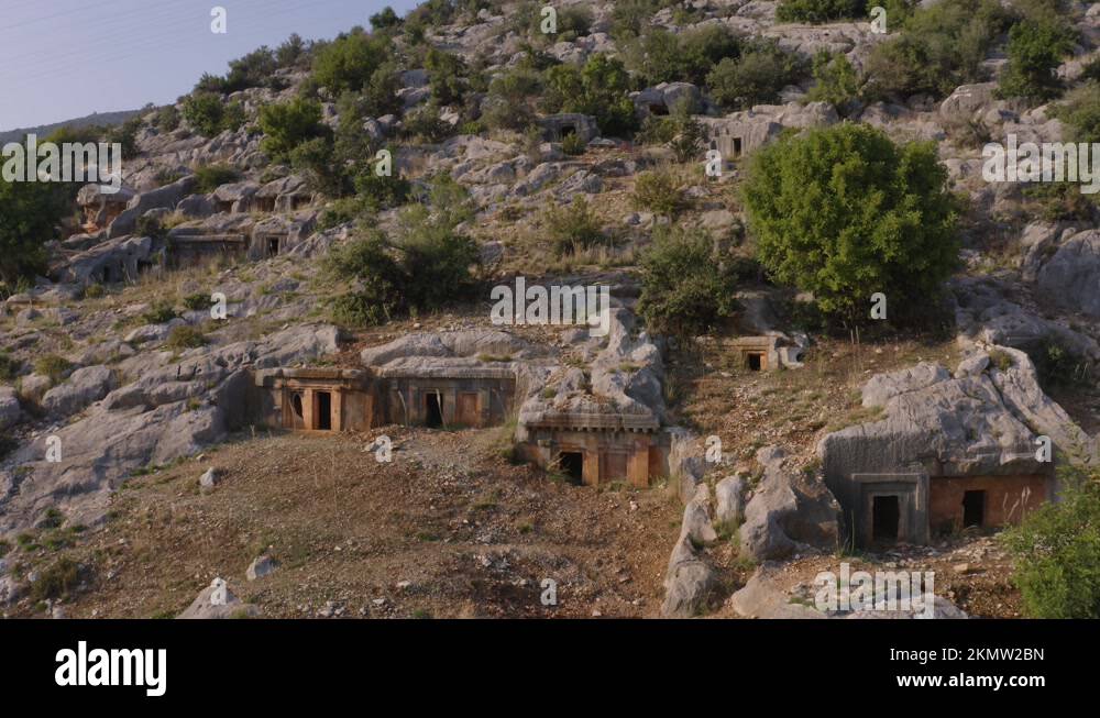 Tombs of an ancient cemetery. Graves carved in rocks on mountain