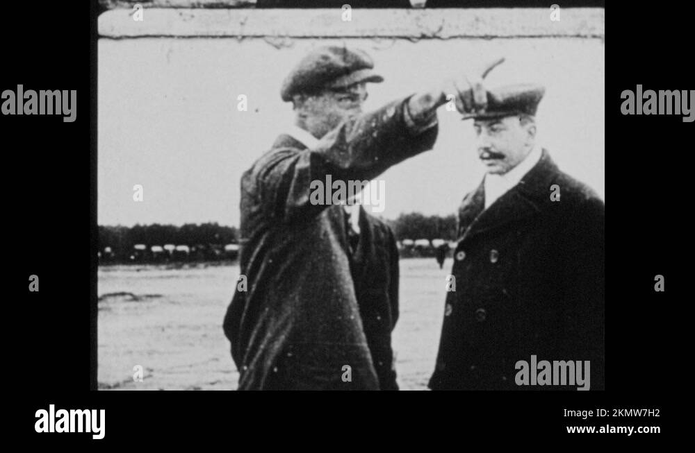1960s Sports stadium. Baseball game. Wright Brothers talking, push