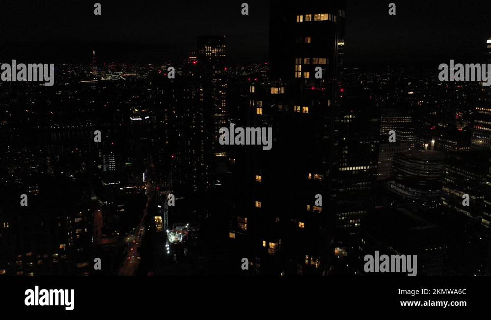 Tall apartment building with seldom lighted windows Stock Video Footage Alamy