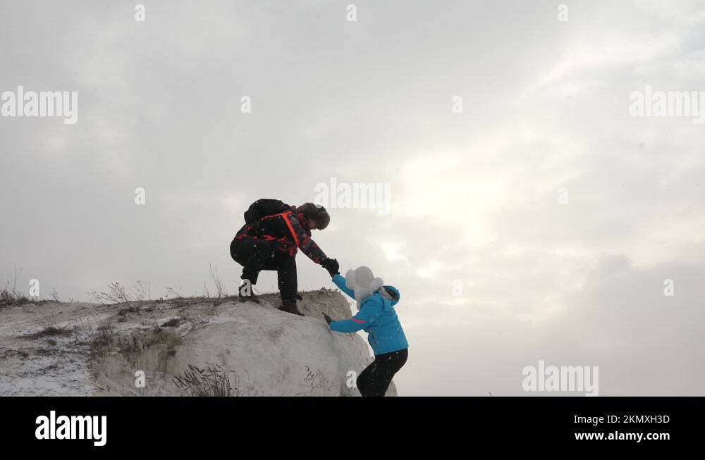 Man helping another man climb Stock Videos & Footage - HD and 4K Video ...
