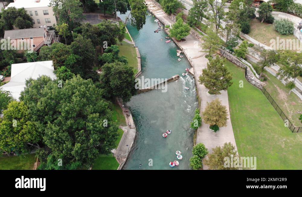 People Tubing on the Comal River in New Braunfels, Texas Stock Video