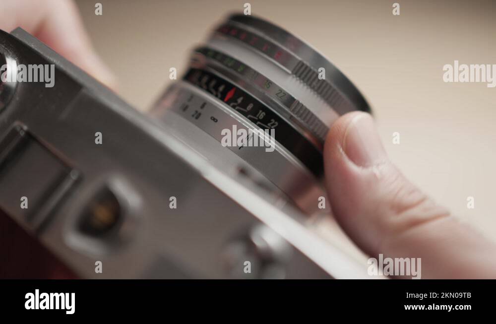 Adjusting The Focus Ring of a Vintage Film Camera Closeup Stock Video