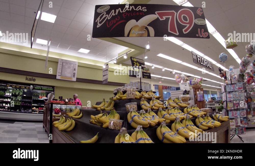 Ingles retail grocery store interior produce area and customer pan