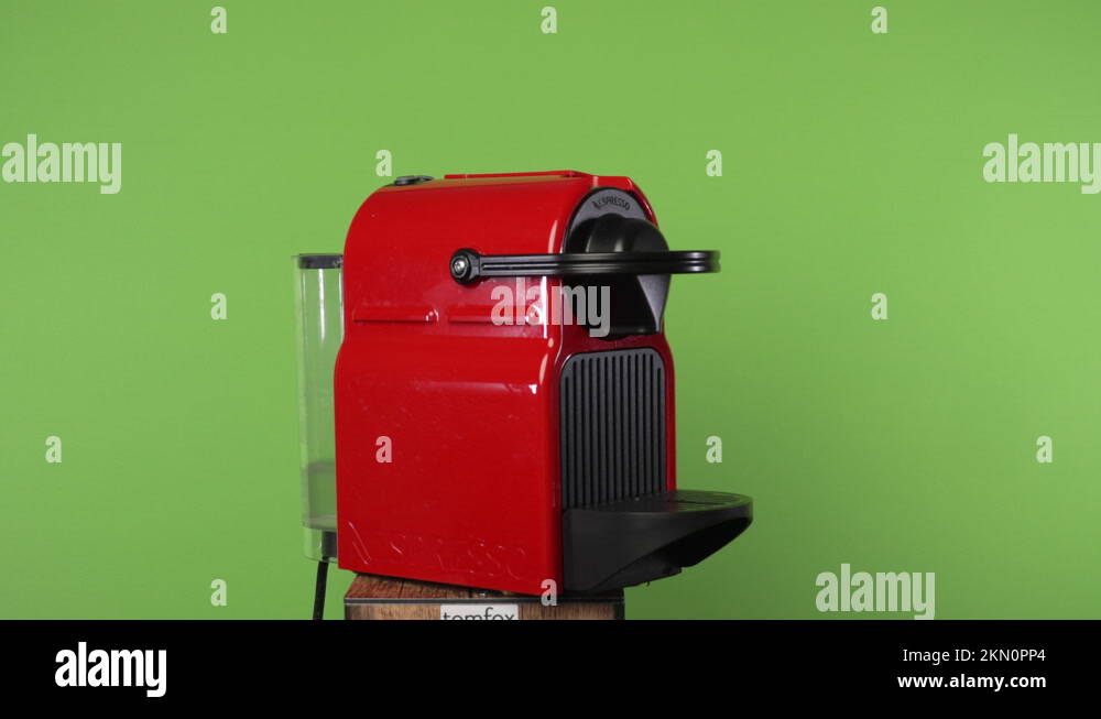Nespresso Machine making coffee in front of chroma green screen Stock Video Footage Alamy