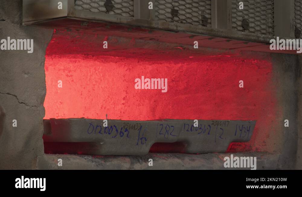 Very hot Industrial Oven Door Closing to melt metal at manufacturing