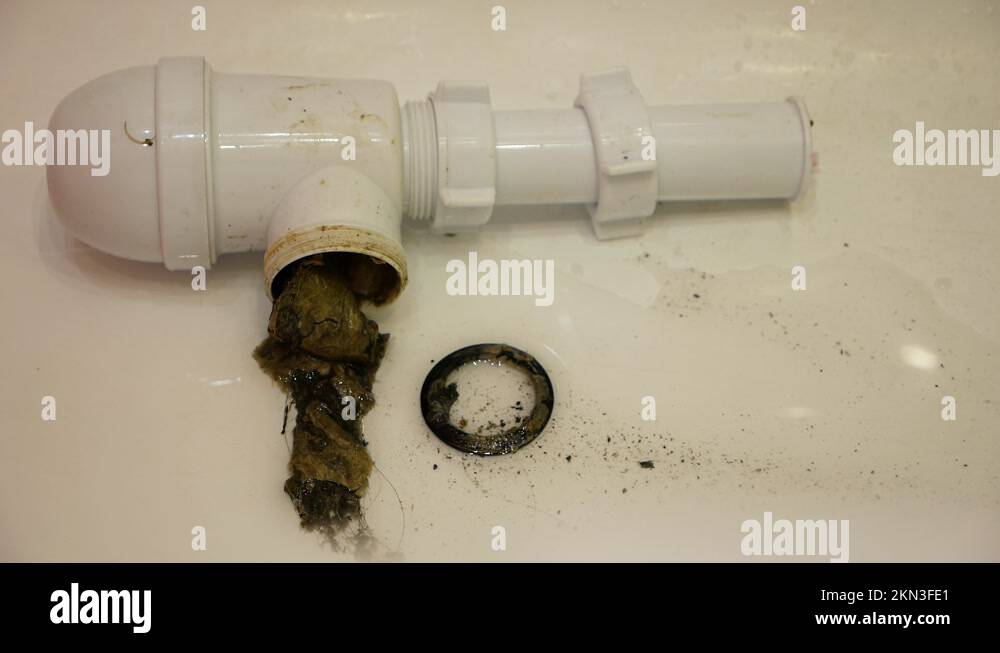 House sewerage repair and cleaning. Bathroom drain pipes clogged with