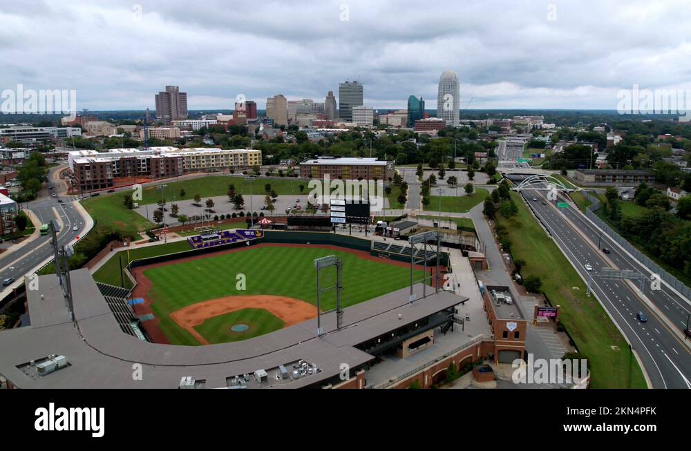 winston salem nc aerial pullout from skyline over baseball stadium