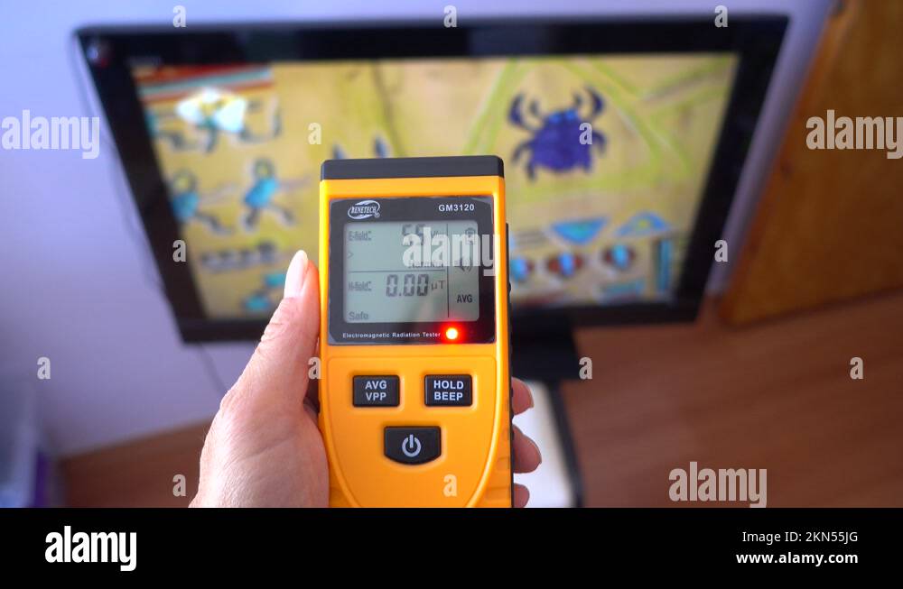 Alarming radiation detector against a TV set 2 Stock Video Footage Alamy