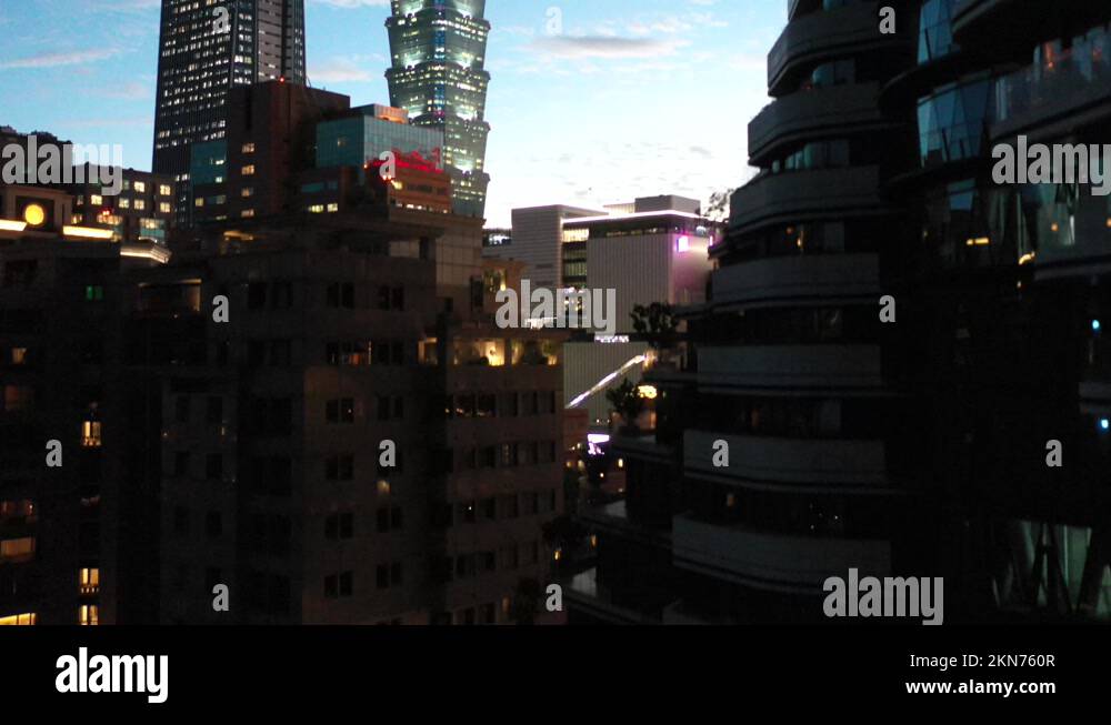 Cinematic aerial pedestal up shot capturing Taipei 101 tallest building