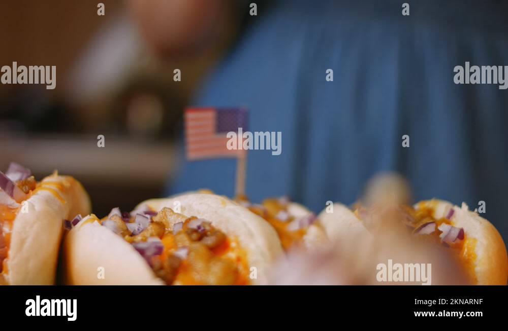 I put the USA flag chili cheese Hot Dogs. 4k video Stock Video Footage