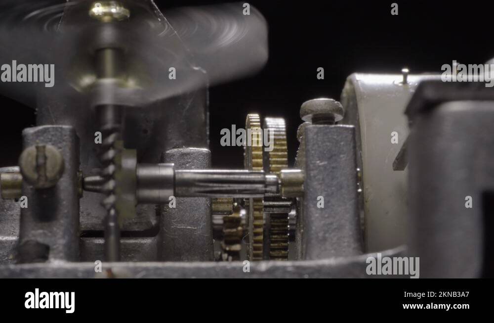 Internal working mechanism of an old mechanical music box. Rotating